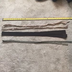 Lot of brown toned belts/ties